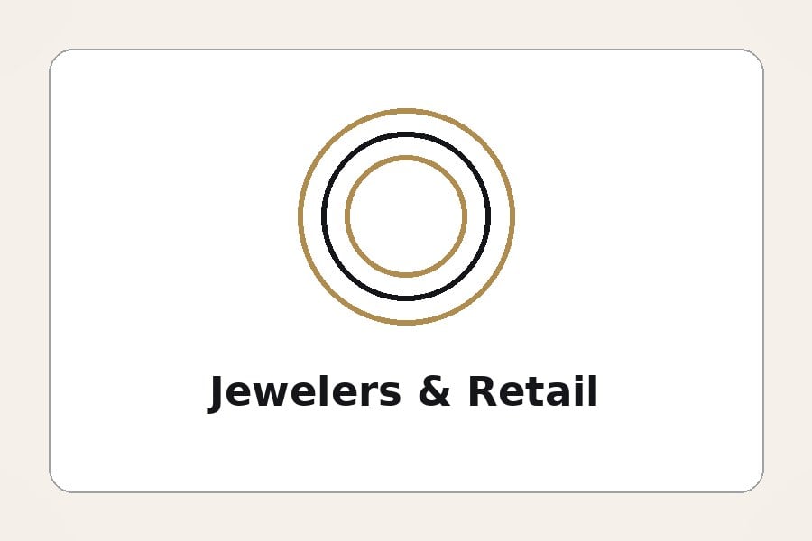 Branded watch boxes on a generic jeweler's display counter